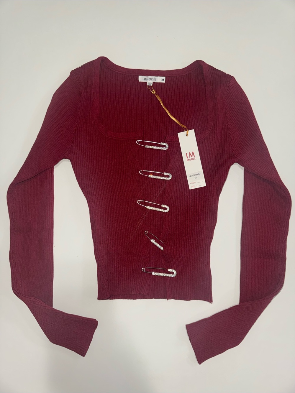 Burgundy Ribbed Long-Sleeve Top with Safety Pin Accents